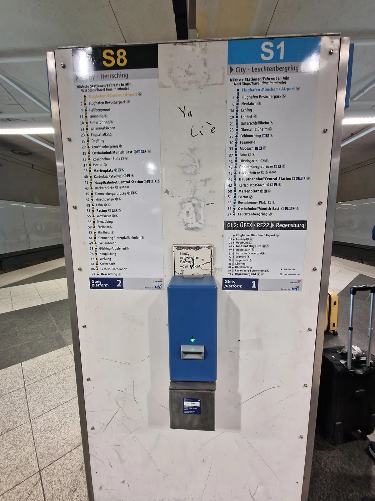 Ticket validation machine at Munich Airport station platform