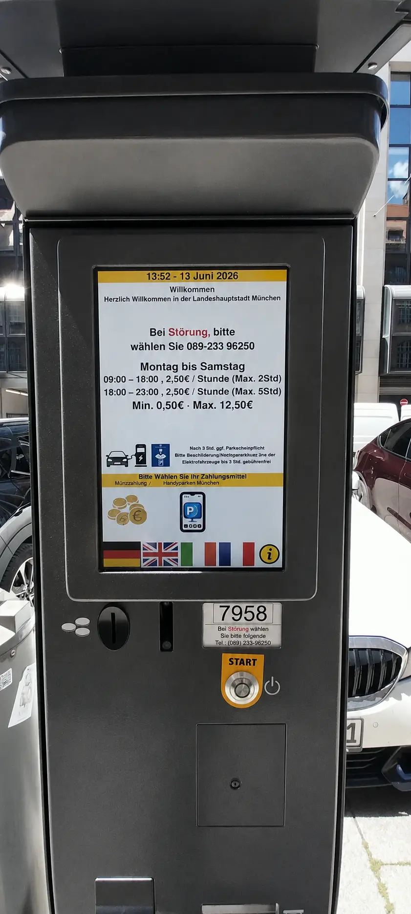 Munich parking ticket machine showing HandyParken option and local parking time rules