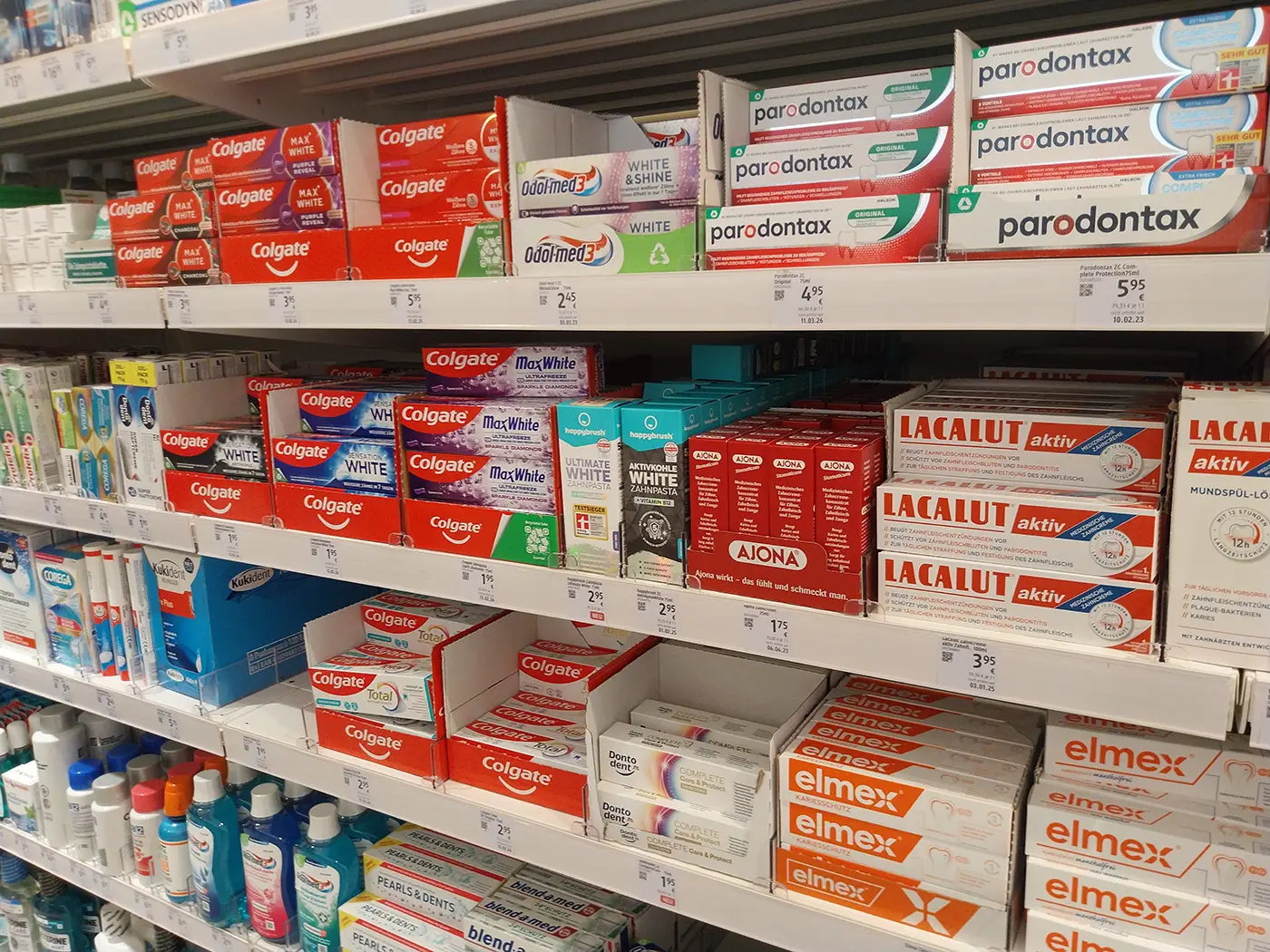 German toothpaste shelf with Ajona Elmex and other toothpaste brands
