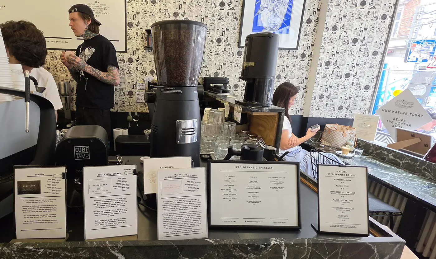 Interior of MAN Versus Machine specialty coffee shop in Munich