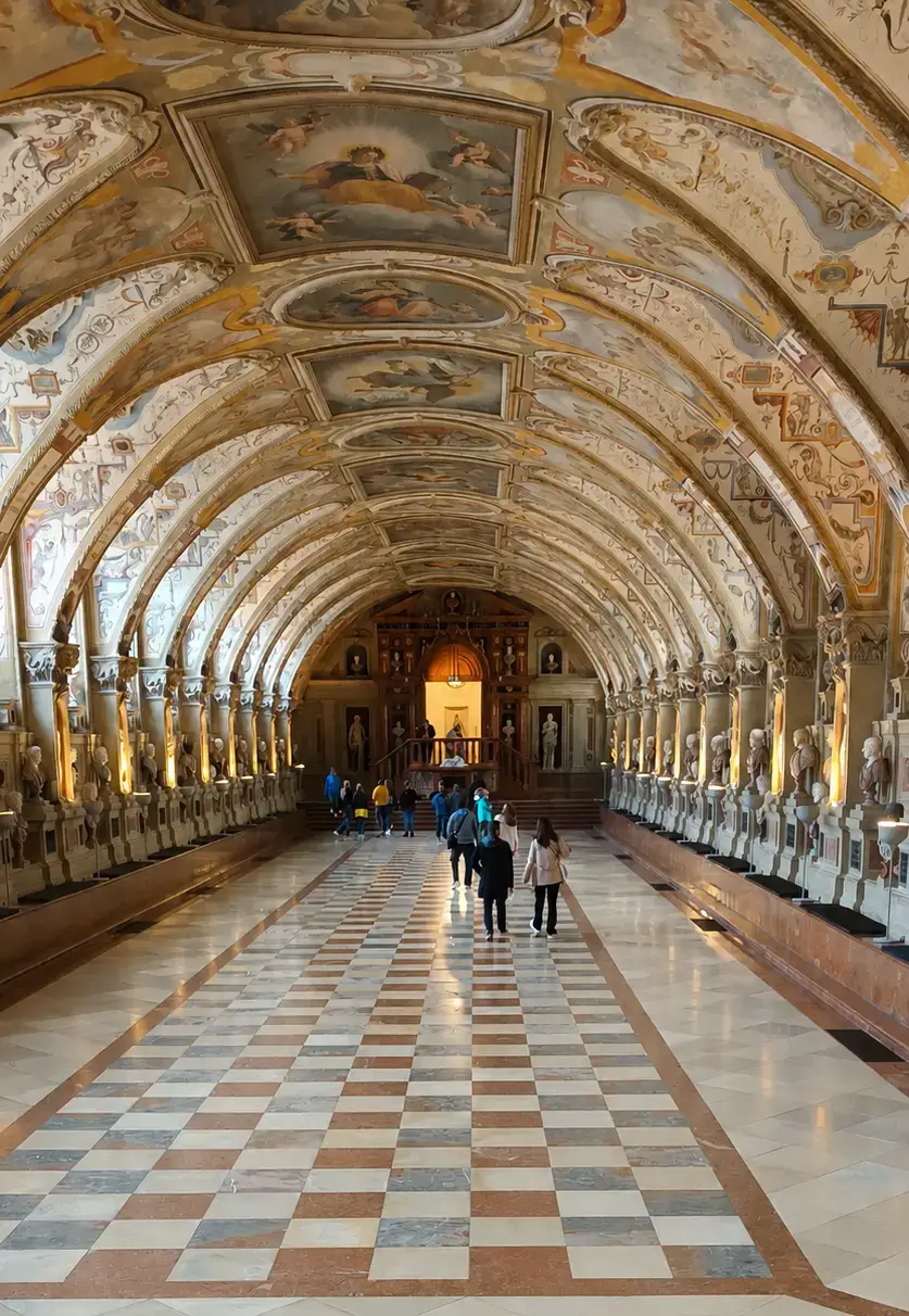 Interior gallery of the Munich Residenz with vaulted ceiling and statues