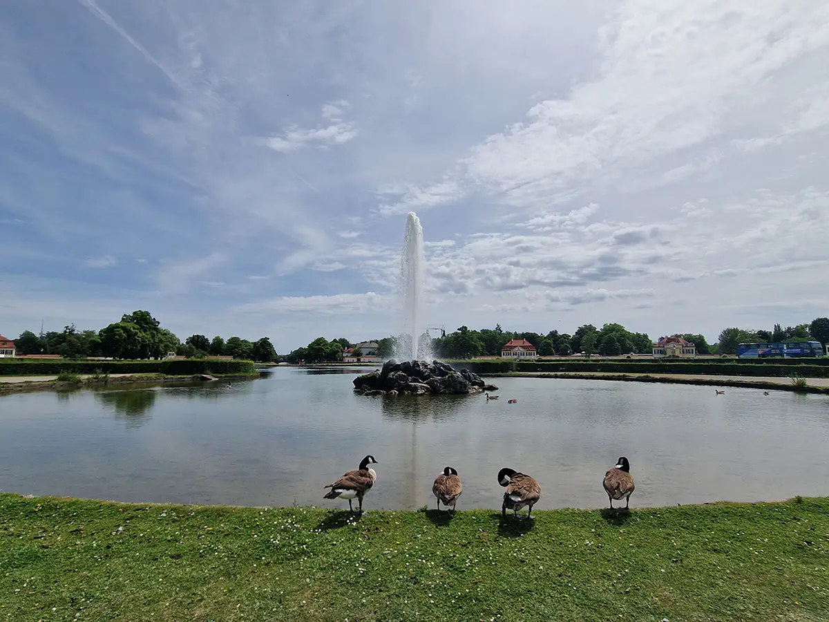 Water fountain and garden landscape at Nymphenburg Palace in Munich