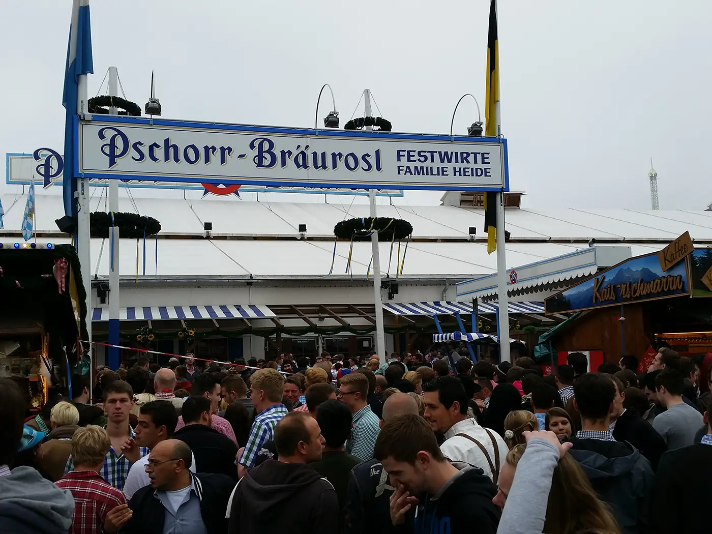 Crowd gathered outside the Pschorr-Bräurosl beer tent at Oktoberfest in Munich