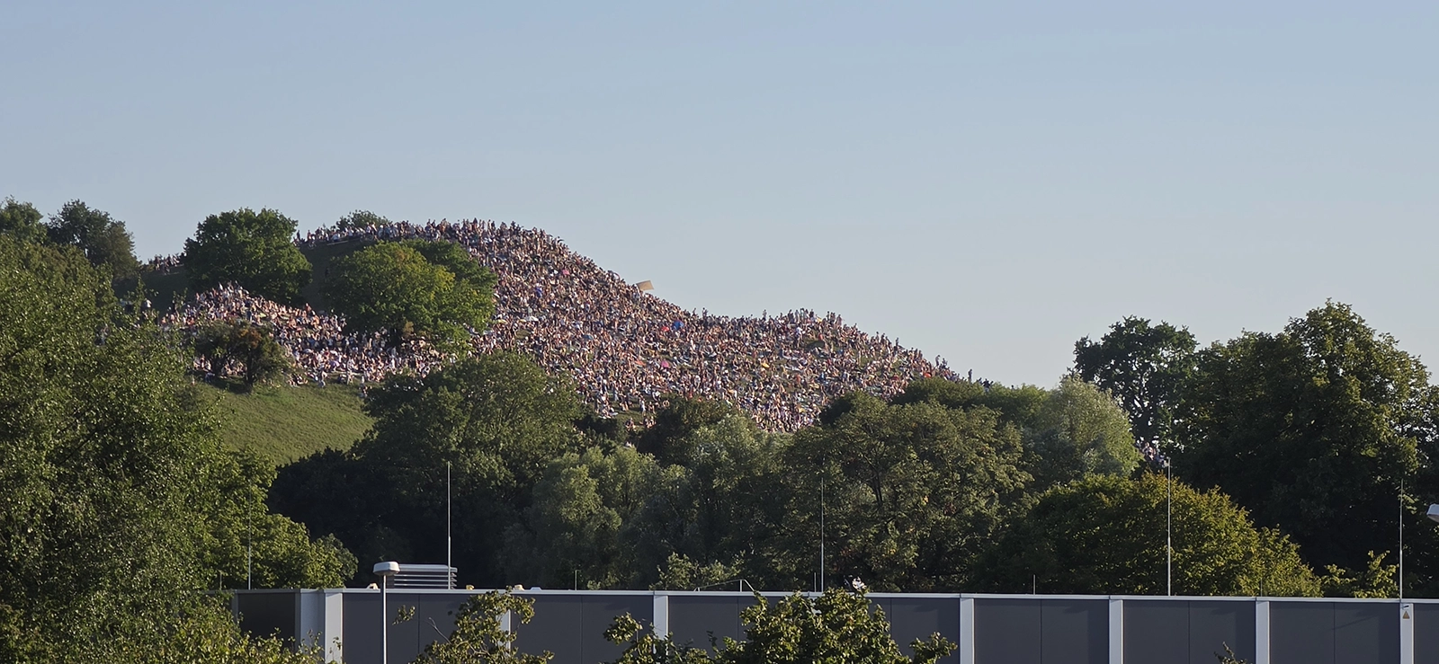 Crowds gathered on Olympiaberg in Munich to watch the August 2026 partial solar eclipse
