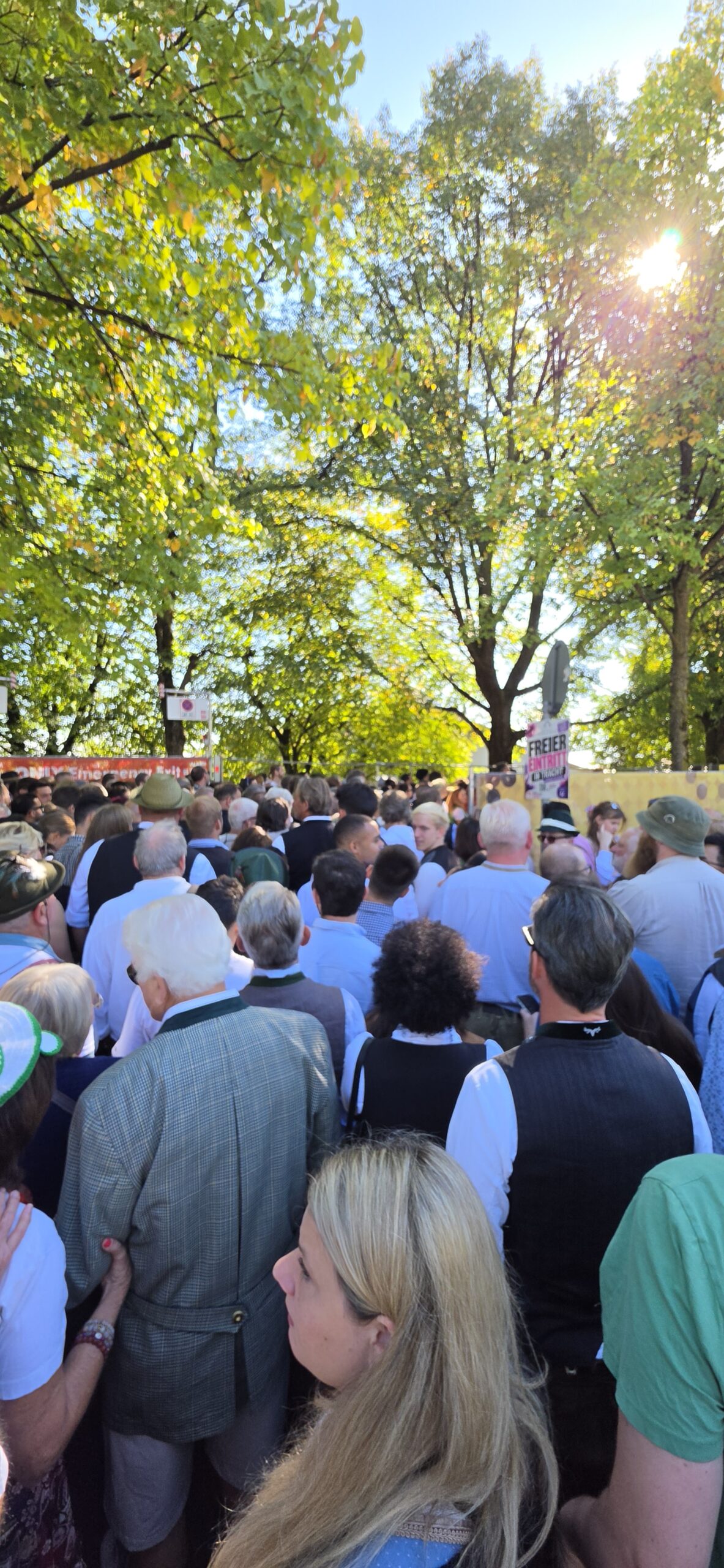 Crowded pedestrian route toward the Oktoberfest entrance on opening day