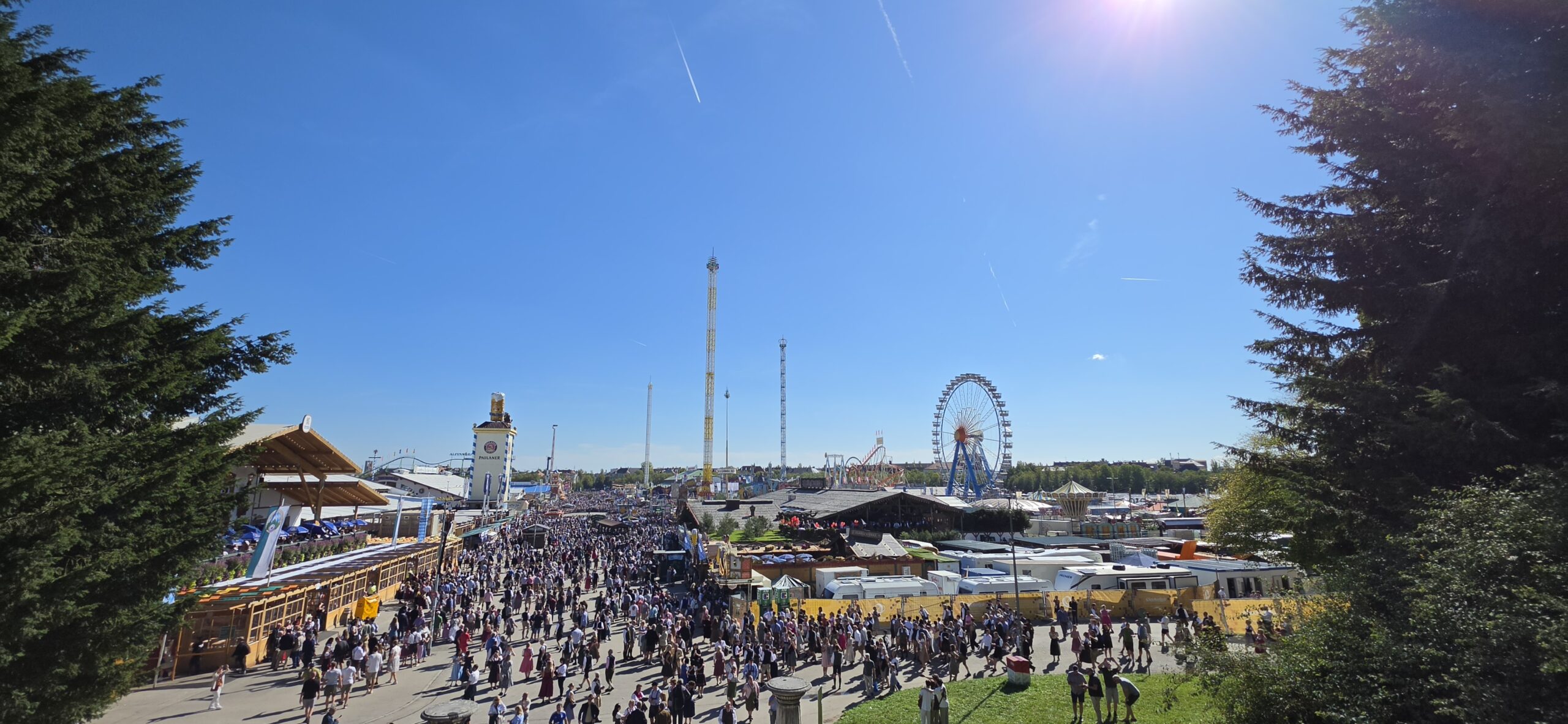 Panoramic view of the crowded Oktoberfest grounds from the Bavaria statue